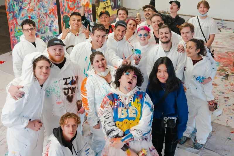 FEWOCiOUS and fans/friends at a paint party