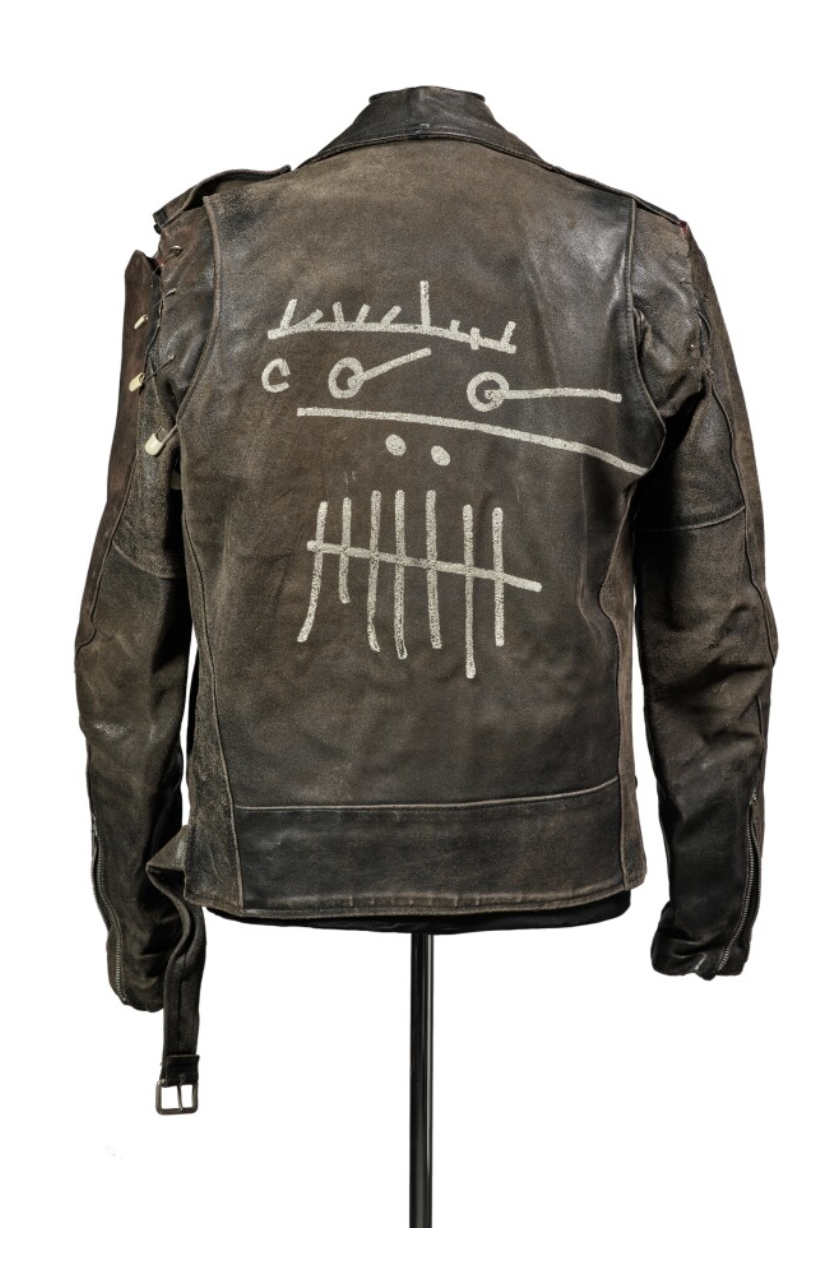 The leather jacket meant to be worn by YT in the original graphic novel concept for Snow Crash featuring the Elmo logo used by her group the Dioxin Posse ca 1989