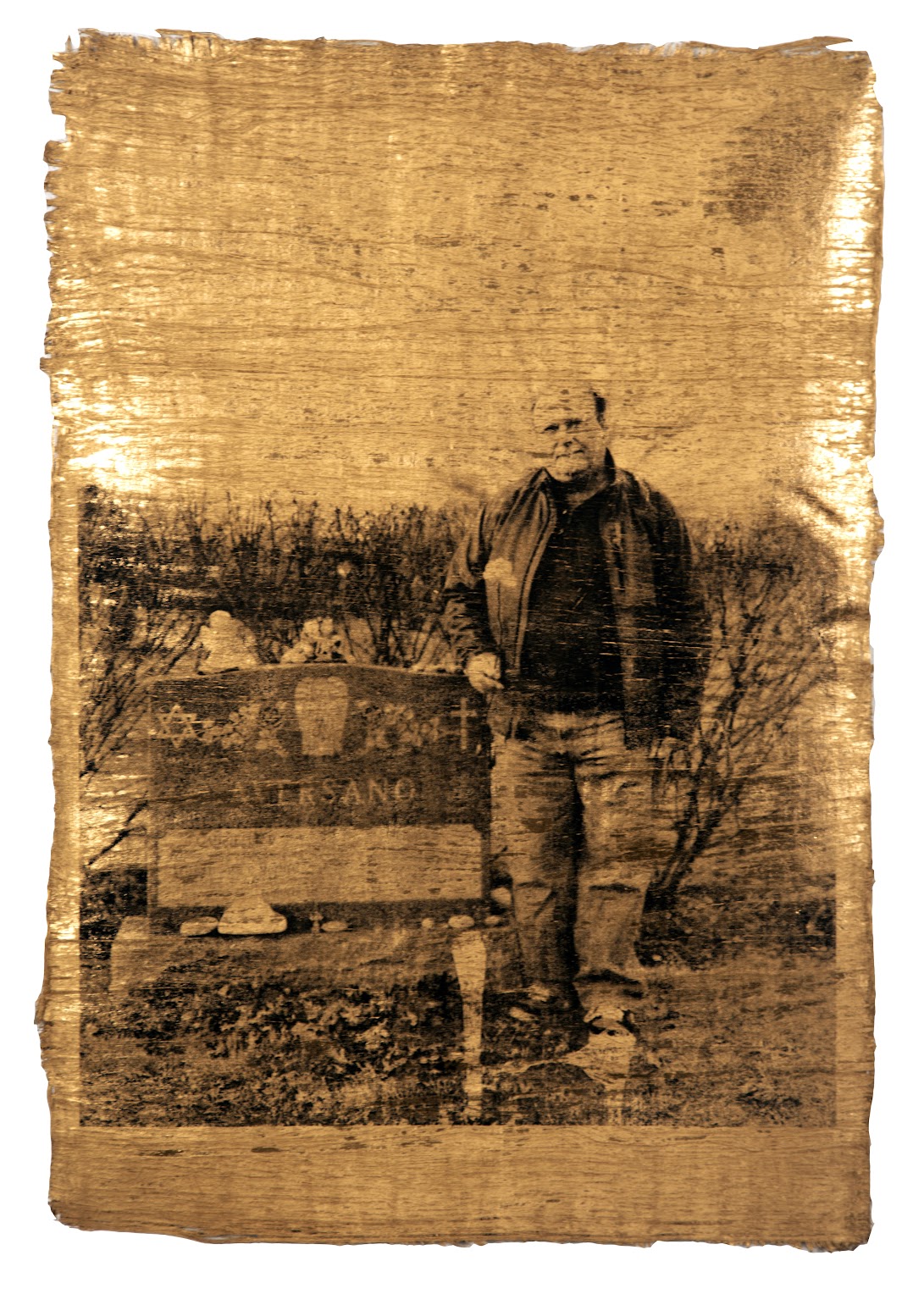 A mixed-media, silkscreen print photograph of a man holding a flower standing next to the grave of his wife. There is an open space on the headstone where his name will be written when he died.